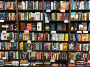 many books on bookstore shelf
