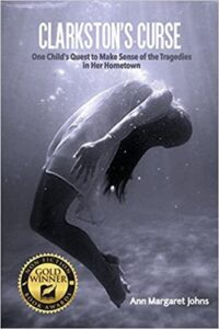 book cover of Clarkston's Curse: One Child's Quest to Make Sense of the Tragedies in Her Hometown, a memoir by Ann Margaret Johns
